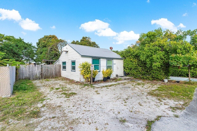 view of front of home with fence