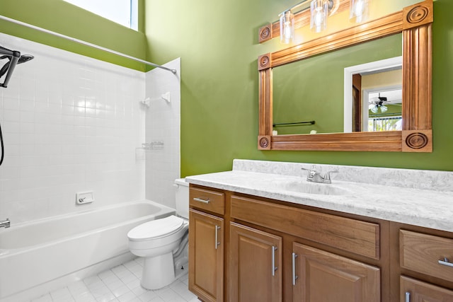 full bathroom featuring bathtub / shower combination, a healthy amount of sunlight, vanity, and toilet