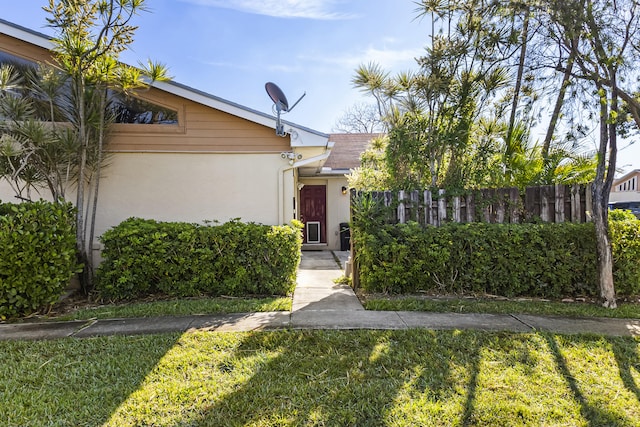 view of front of home with fence