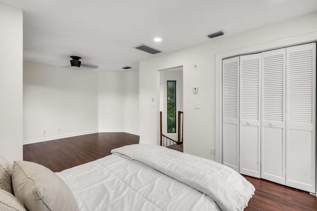 bedroom with recessed lighting, dark wood-style floors, visible vents, and baseboards