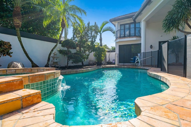 view of swimming pool with a fenced in pool and a fenced backyard