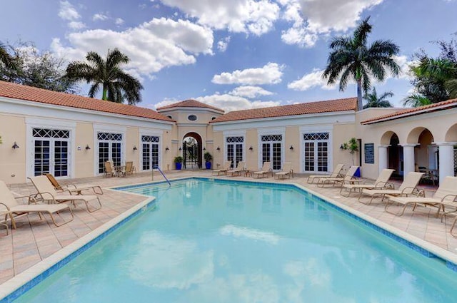 pool featuring a patio and french doors