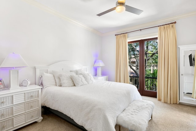 carpeted bedroom with ornamental molding, access to exterior, and a ceiling fan