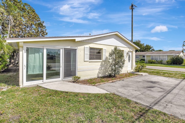 exterior space with a yard