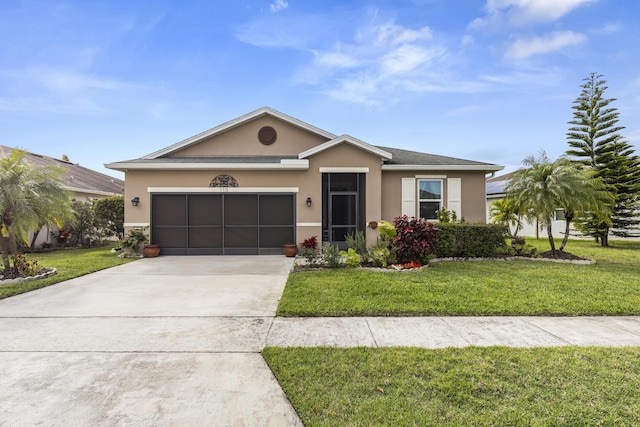 view of front of house with concrete driveway, an attached garage, a front lawn, and stucco siding