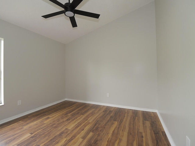 spare room featuring ceiling fan, baseboards, and wood finished floors
