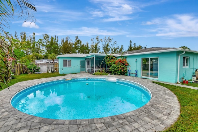 view of pool featuring a fenced backyard, a fenced in pool, and a yard