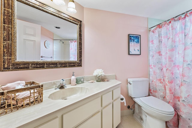 bathroom featuring toilet, curtained shower, tile patterned flooring, and vanity