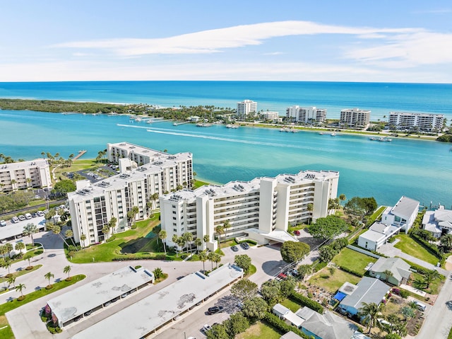 aerial view featuring a city view and a water view