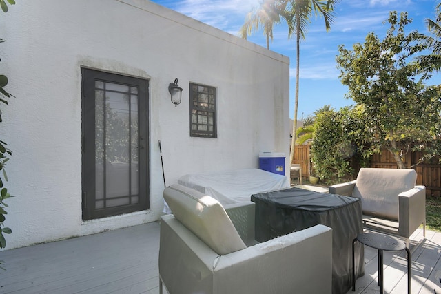 view of patio featuring fence