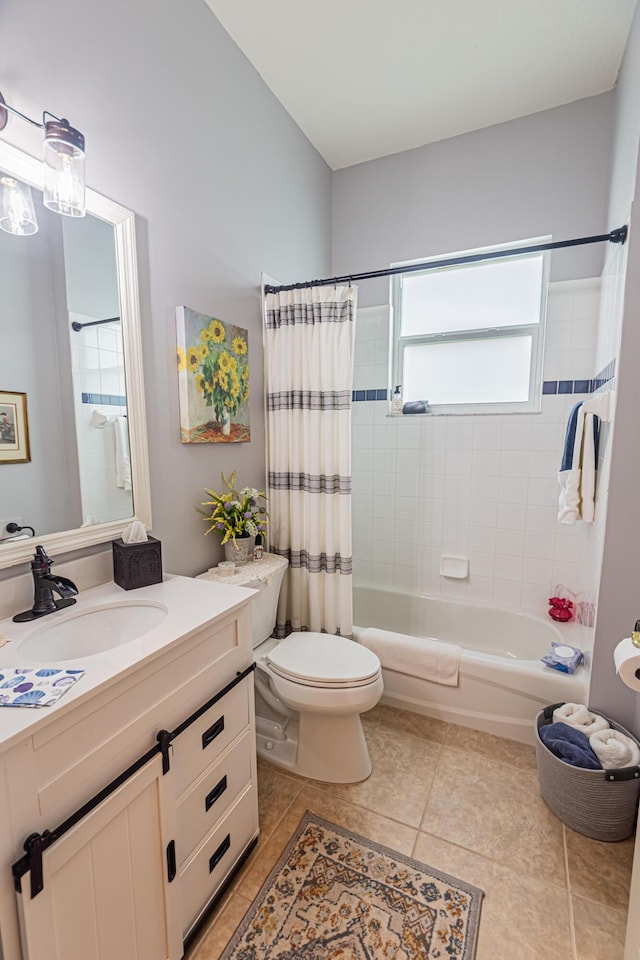 bathroom featuring tile patterned flooring, shower / tub combo, toilet, and vanity