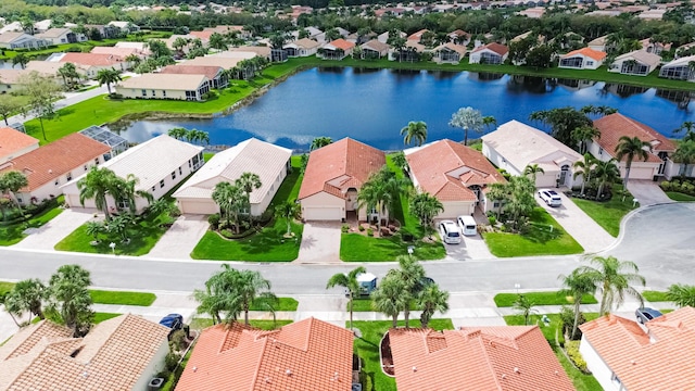 aerial view with a water view and a residential view