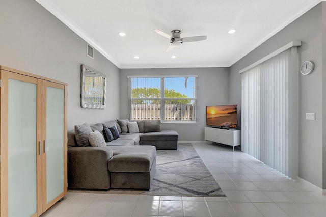 living area featuring ceiling fan, light tile patterned flooring, recessed lighting, visible vents, and crown molding