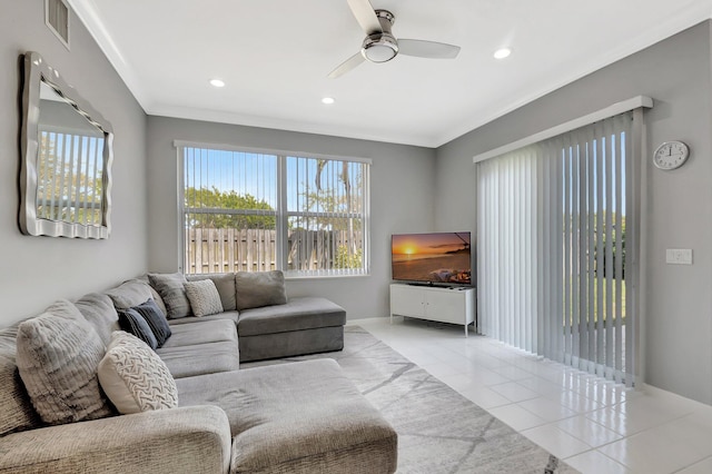 living room with light tile patterned floors, ceiling fan, visible vents, and recessed lighting