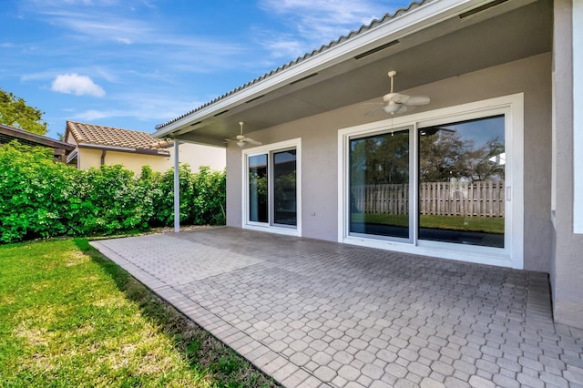 view of patio with ceiling fan