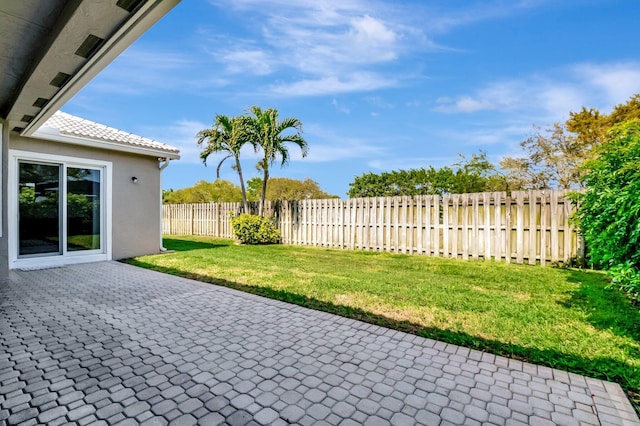 view of patio with a fenced backyard