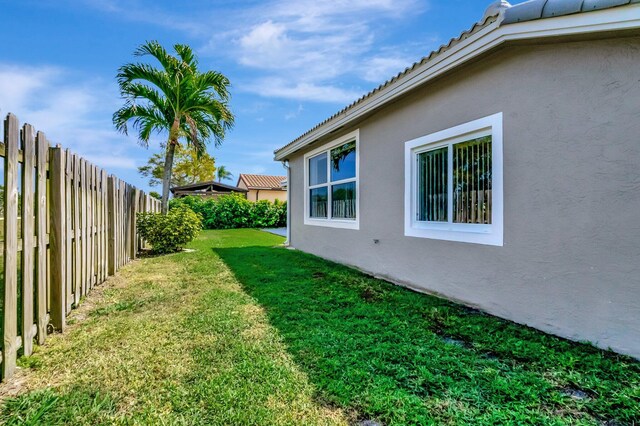 view of yard with fence