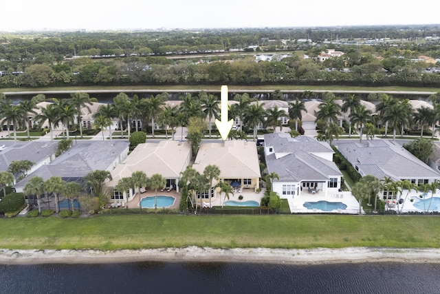 aerial view featuring a water view and a residential view