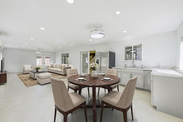 dining area featuring a wall mounted AC, recessed lighting, light tile patterned floors, and french doors