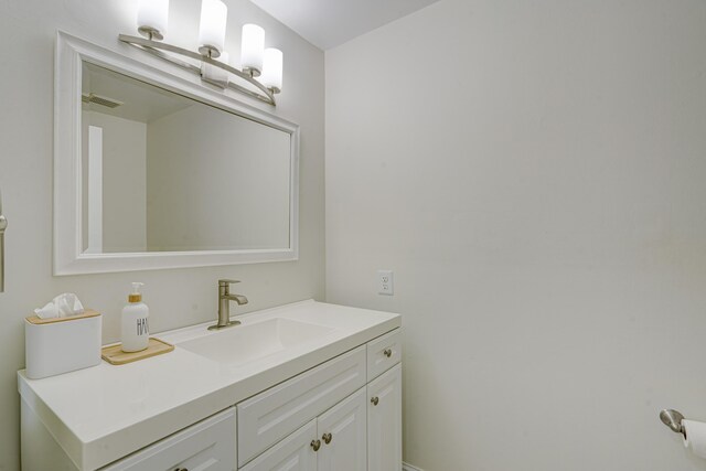 bathroom with visible vents and vanity