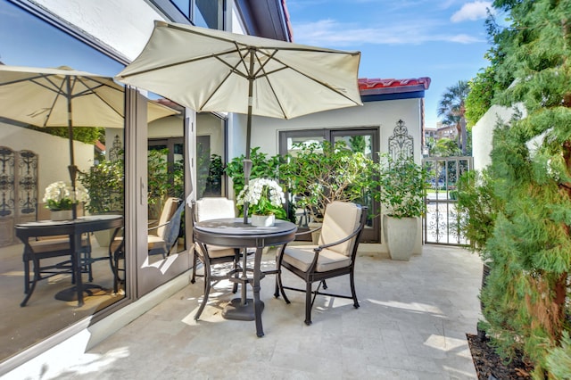 view of patio featuring outdoor dining space