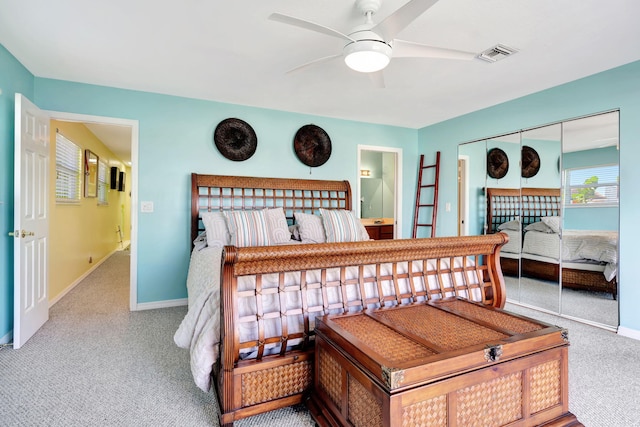 bedroom featuring baseboards, visible vents, and carpet flooring