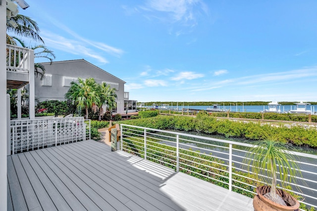 deck featuring a water view