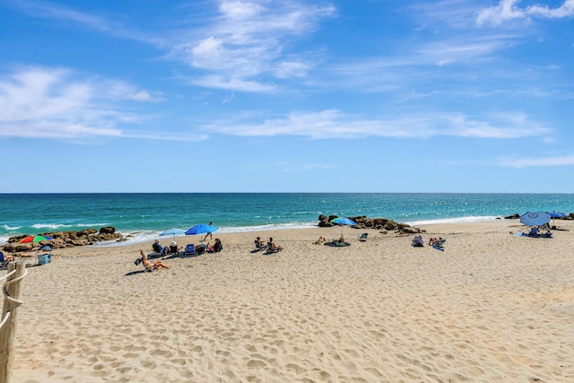 view of water feature with a beach view