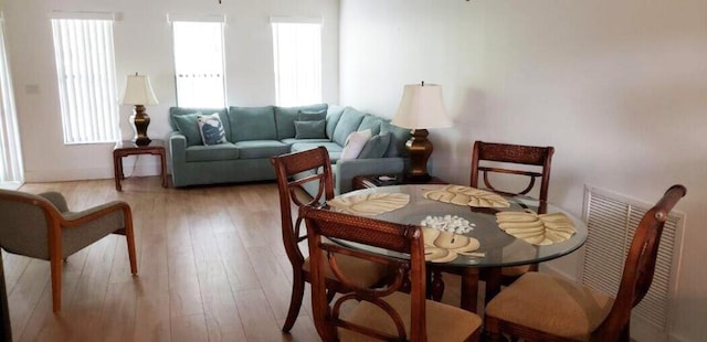 dining area featuring hardwood / wood-style floors