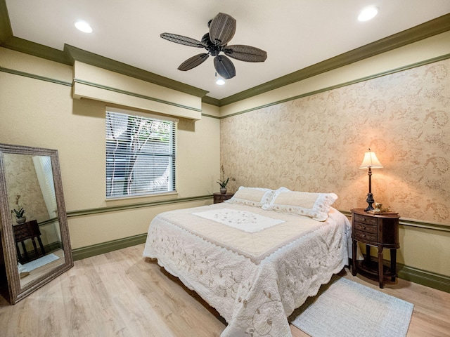 bedroom with ornamental molding, recessed lighting, wood finished floors, and baseboards