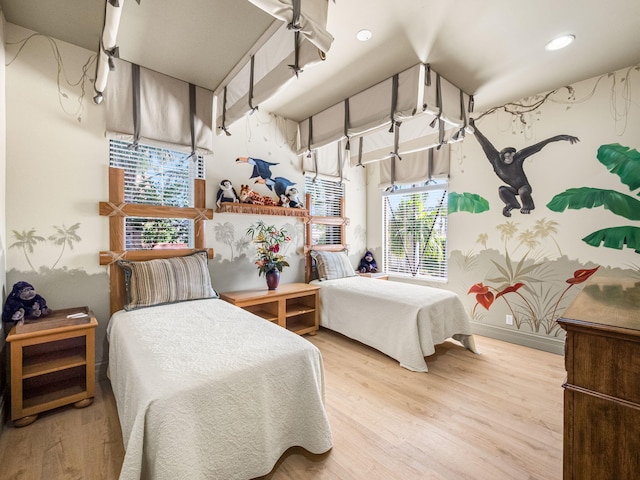 bedroom featuring wood finished floors