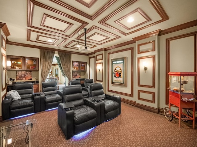 home theater room featuring baseboards and crown molding