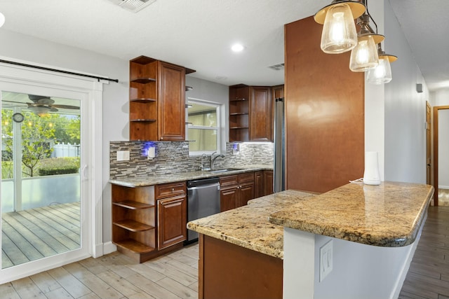 kitchen with open shelves, appliances with stainless steel finishes, a sink, and light wood-style flooring