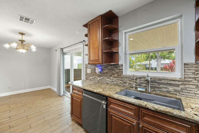 kitchen with visible vents, decorative backsplash, dishwasher, open shelves, and a sink