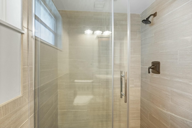 bathroom featuring a stall shower