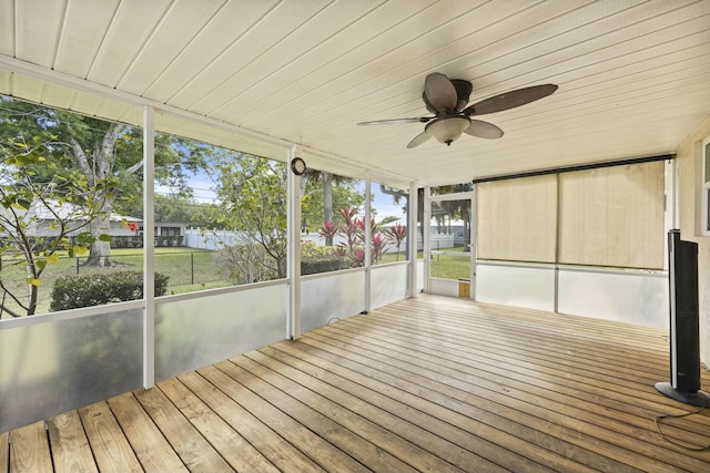 exterior space featuring a ceiling fan