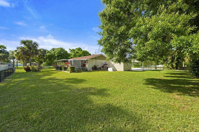 view of yard featuring fence