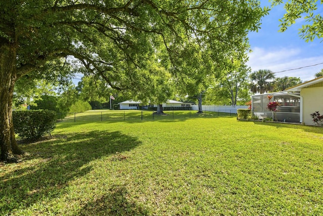 view of yard with a fenced backyard