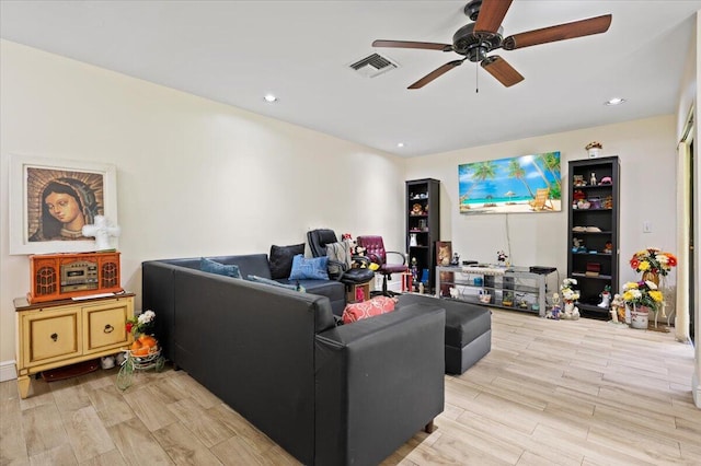 living area featuring recessed lighting, visible vents, ceiling fan, and light wood finished floors