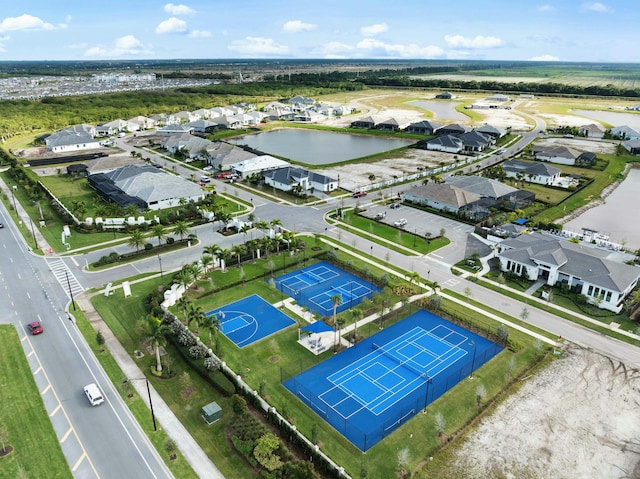 aerial view with a residential view and a water view