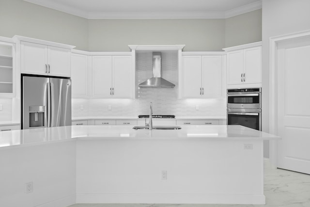 kitchen featuring appliances with stainless steel finishes, marble finish floor, white cabinetry, and wall chimney range hood