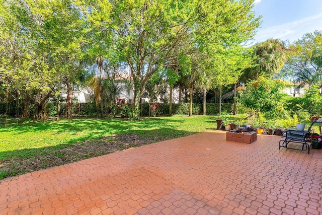 view of patio / terrace featuring a fire pit