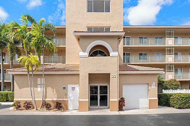 view of property featuring a garage