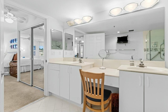 full bathroom featuring visible vents, a ceiling fan, connected bathroom, and vanity