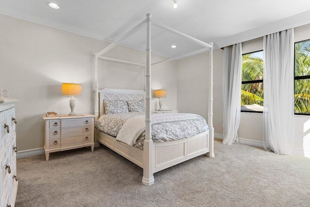 bedroom with carpet floors, recessed lighting, crown molding, and baseboards