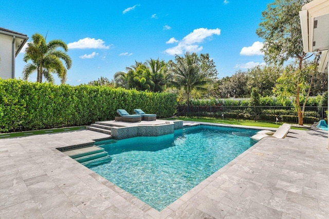 view of swimming pool with a patio area, a fenced backyard, and a fenced in pool