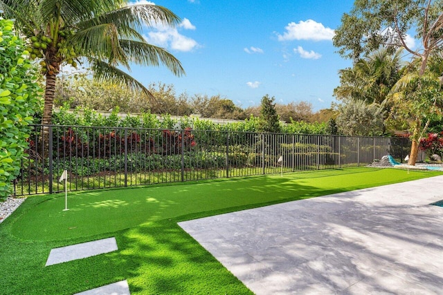 view of property's community with fence