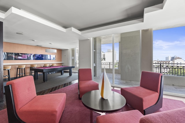 game room with a wall of windows, a view of city, and pool table