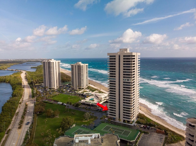 bird's eye view with a beach view and a water view