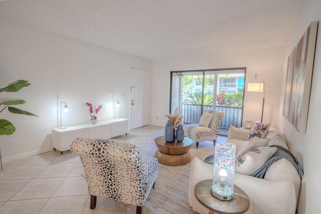 9785 Pineapple Tree Dr Unit 103, Boynton Beach, FL 33436 - living area with light tile patterned floors and a textured ceiling